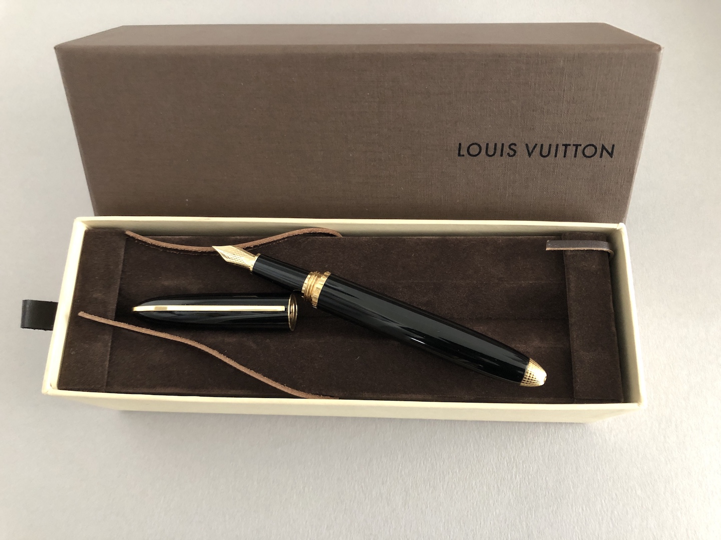 Louis Vuitton Black Leather Gold Tone Doc Fountain Pen at 1stDibs